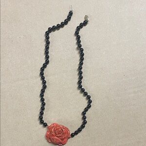 Elegant Black Beaded Necklace with Red Rose Pendant